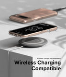 Google Pixel 8 Case | Fusion - A clear phone case on a Google Pixel 8 charging wirelessly on a grey circular pad.