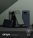 Google Pixel 8 Case | Onyx - Multiple Google Pixel 8 Onyx cases in black, green, and blue arranged on a dark surface.