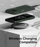 Google Pixel 8 Case | Onyx - Onyx case on a Google Pixel 8 hovering over a wireless charging pad on a white block.