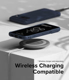 Google Pixel 8 Case | Onyx - A navy blue phone case on a wireless charging pad with a white block background.