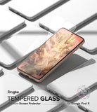 Google Pixel 8 Screen Protector | Glass - Tempered glass screen protector hovering above a Google Pixel 8 smartphone.