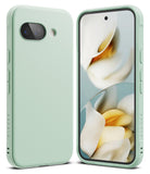 Google Pixel 9a Case | Onyx - Mint green phone case shown from back and front with a floral wallpaper on the screen.