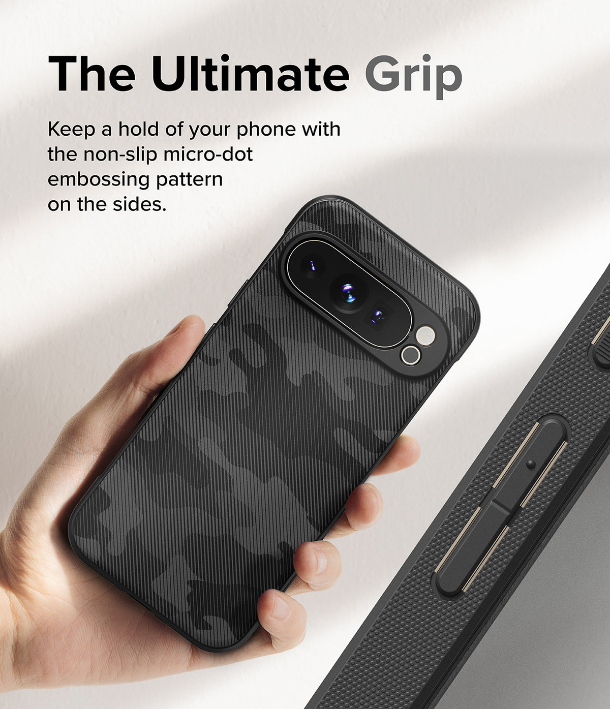 Google Pixel 9 Pro Case | Onyx - Hand holding a black camo-patterned phone case with textured micro-dot side grips.