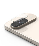 Google Pixel 9 | Camera Glass - A transparent protective glass cover hovering above the rear camera module of a beige smartphone.