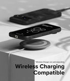 Google Pixel 9 Case | Onyx - A black phone case on a wireless charging pad with another phone in the background.