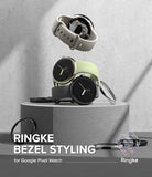 Google Pixel Watch 41mm | Bezel Styling - Three Pixel Watches with colorful bands and metallic bezel rings on a pedestal.
