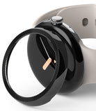 Google Pixel Watch 41mm | Premium Bezel Styling - Google Pixel Watch 41mm - A black textured bezel accessory hovering over a black smartwatch with a light grey band.