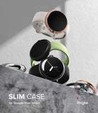 Google Pixel Watch Case | Slim - Three Google Pixel Watches with various colored slim cases stacked on a concrete ledge.