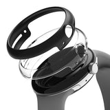 Google Pixel Watch Case | Slim - Exploded view of a black watch case and clear protective cover hovering over a smartwatch.