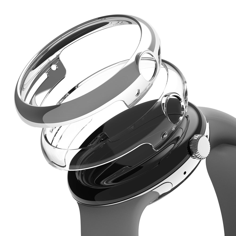Google Pixel Watch Case | Slim - Clear protective case hovering above a black Google Pixel Watch with a grey band.