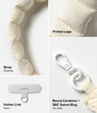 Holder Link Puffer | Hand - Close-up of cream puffer strap, printed logo, nylon holder link, and white zinc alloy carabiner.