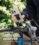 Quick & Go | Universal Adapter Mount Add-on - Hand holding a phone with a black adapter attached above a bike mount.