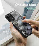 Xiaomi Redmi Note 11 / 11S Case | Fusion - Hand holding a phone with a black and white camo pattern case and satin finish.