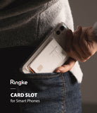 Card Holder | Slot [3 Cards] - A clear phone case with an attached card holder being placed into a blue denim pocket.