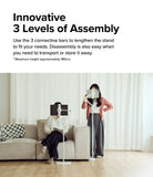 Ringke Stand Floor Holder - Two white adjustable floor stands holding tablets at different heights in a living room.