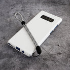 Paracord Lanyard Wrist Strap [2 Pack] - Checkered gray paracord wrist strap attached to a white smartphone case.