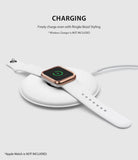 Apple Watch Series 3 / 2 / 1 (38mm) | Premium Bezel Styling O - White Apple Watch with rose gold bezel charging on a pad.
