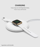 Apple Watch 3 / 2 / 1 (42mm) | Bezel Styling - Apple Watch with gold bezel styling charging on a white wireless pad.