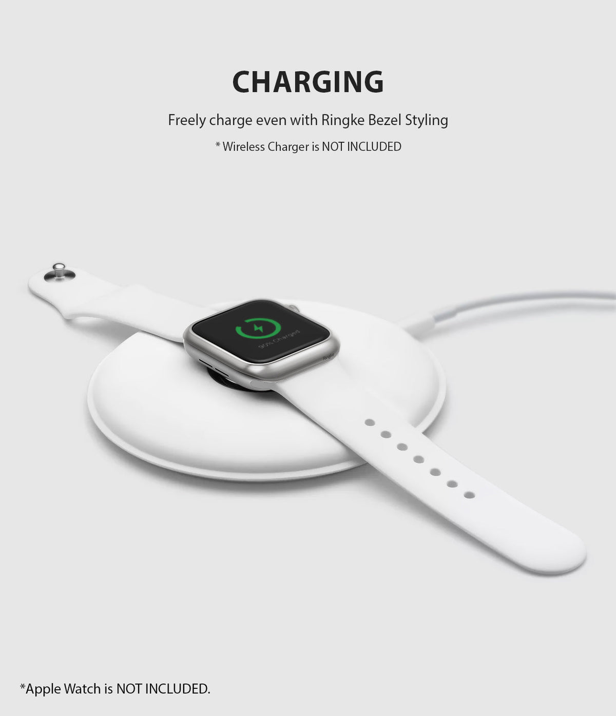 Apple Watch 3 / 2 / 1 (42mm) | Bezel Styling - Apple Watch with bezel styling charging on a white wireless pad.