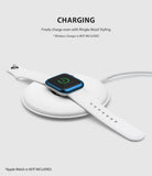 Apple Watch 3 / 2 / 1 (42mm) | Bezel Styling - Apple Watch with blue bezel styling charging on a white wireless pad.