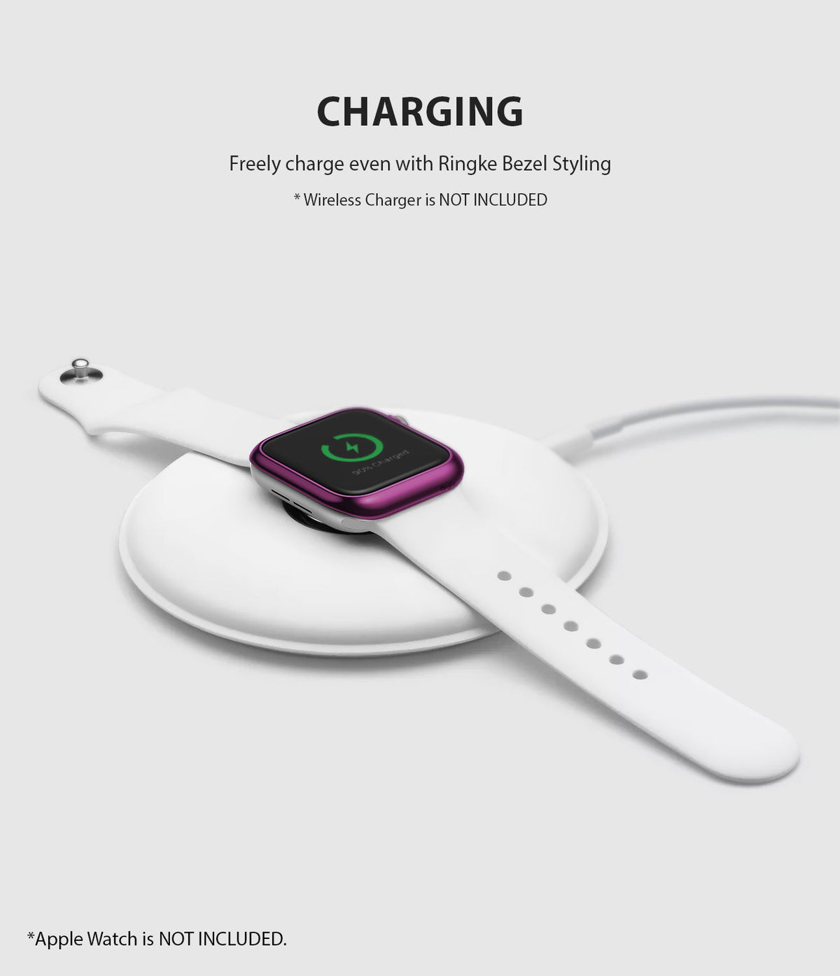 Apple Watch 3 / 2 / 1 (42mm) | Bezel Styling - Apple Watch with purple bezel styling charging on a white wireless pad.