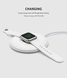Apple Watch Series 3 / 2 / 1 (42mm) | Premium Bezel Styling H - Apple Watch with silver bezel styling charging on a pad.