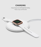 Apple Watch Series 3 / 2 / 1 (42mm) | Premium Bezel Styling H - Rose gold bezel on a white Apple Watch charging wirelessly.
