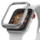 Apple Watch Series 3 / 2 / 1 (38mm) | Premium Bezel Styling O - Silver ribbed bezel accessory hovering over watch face.