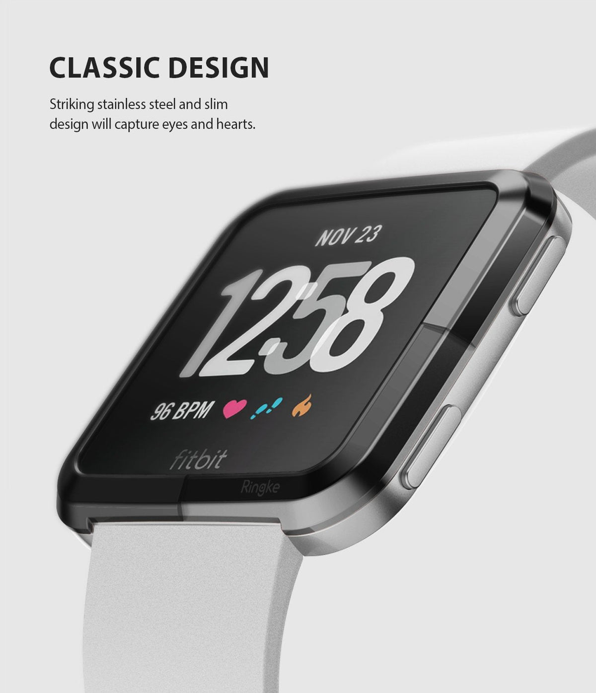 Fitbit Versa | Bezel Styling 03 - Close-up of a black stainless steel bezel accessory on a Fitbit Versa with a white band.