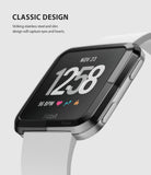 Fitbit Versa | Bezel Styling 03 - Close-up of a black stainless steel bezel accessory on a Fitbit Versa with a white band.