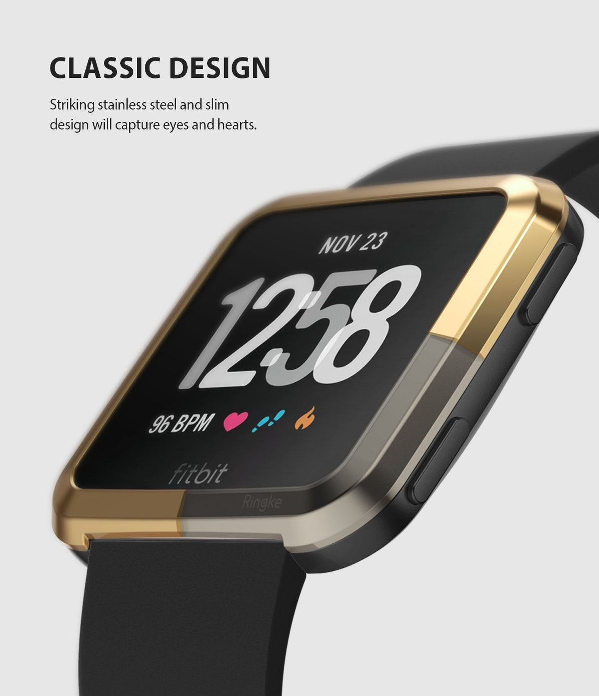 Fitbit Versa | Bezel Styling 05 - A gold stainless steel bezel accessory attached to a black Fitbit Versa smartwatch.