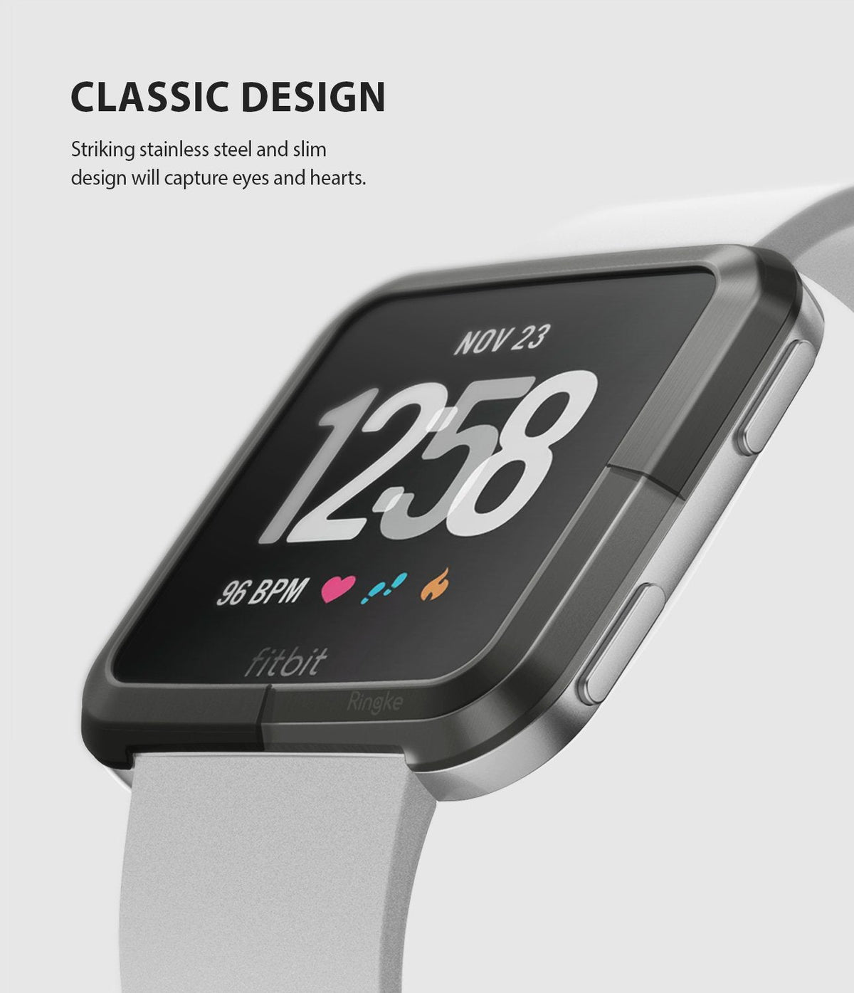 Fitbit Versa | Bezel Styling 06 - A sleek, dark stainless steel bezel accessory attached to a Fitbit Versa with a light gray band.