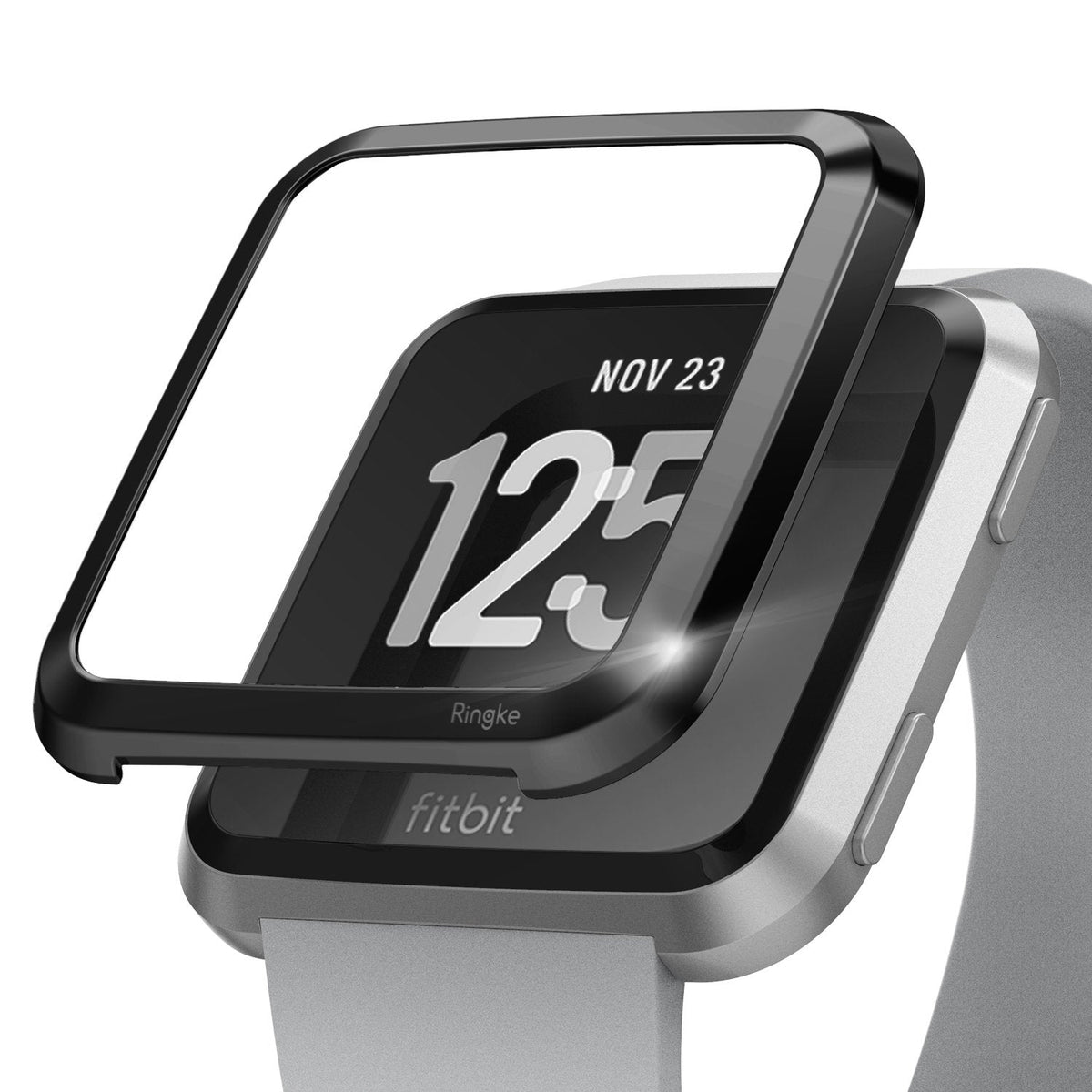 Fitbit Versa | Bezel Styling 03 - Black metal bezel cover hovering above a silver Fitbit Versa smartwatch.