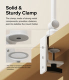 Ringke Clamp Holder - White metal clamp attached to a desk with protective pads and a sturdy adjustable screw mechanism.