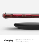 Galaxy Note 10 Case | Fusion-X - Ruby red phone case on a smartphone hovering above a black wireless charging pad.