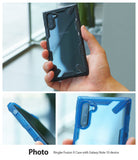 Galaxy Note 10 Case | Fusion-X - Hand holding a Galaxy Note 10 in a rugged, transparent Fusion-X protective case.