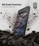 Galaxy S10 5G Case | Fusion - Camo-patterned phone case surrounded by flying dirt, highlighting mil-grade shock absorption.