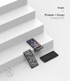 Galaxy S10 5G Case | Fusion - Three Galaxy S10 5G phones with camo-patterned cases arranged on white stairs.