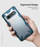 Galaxy S10 Case | Fusion-X - A hand holding a Galaxy S10 in a blue, rugged, transparent Fusion-X case against a light background.