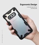 Galaxy S10e Case | Fusion-X - Hand holding a Samsung Galaxy S10e in a black, rugged, transparent Fusion-X protective case.