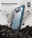 Galaxy S10e Case | Fusion-X - Blue Fusion-X case on a Galaxy S10e surrounded by flying dirt, highlighting military-grade protection.
