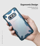 Galaxy S10e Case | Fusion-X - Hand holding a Galaxy S10e in a blue, rugged, transparent Fusion-X protective case.