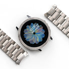 Galaxy Watch Active 2 44mm | Metal One Band - Smartwatch with textured silver bezel and metal link band on white.