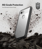Google Pixel 3a XL Case | Fusion - Clear phone case with black bumper standing in dirt with dust particles flying.