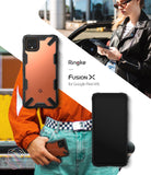 Google Pixel 4 XL Case | Fusion-X - Rugged black protective case shown on a Google Pixel 4 XL against a lifestyle background.