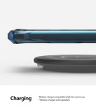 Google Pixel 4 XL Case | Fusion-X - A blue phone case hovering above a black wireless charging pad.