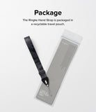 Hand Strap | Basic - A black camouflage hand strap next to its clear, recyclable retail packaging on a white background.