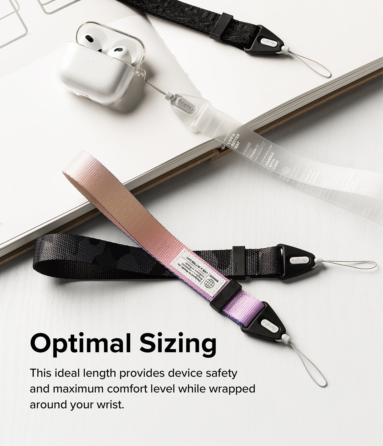 Hand Strap | Basic - Three colorful wrist straps with black connectors and loops arranged on a white surface with AirPods.