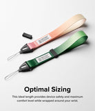 Hand Strap | Basic - Two fabric wrist straps in pink-to-beige and green gradients with black connectors on a white background.