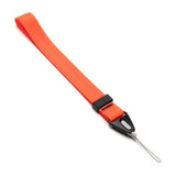 Hand Strap | Black / Neon Orange - Neon orange fabric wrist strap with a black plastic connector and thin loop attachment.